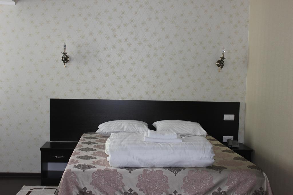 Home Hotel Astana Номер фото